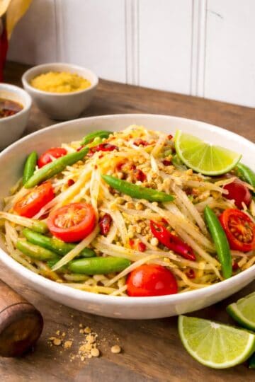thai papya salad on a woold counter